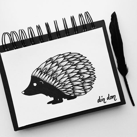 Original black-ink hedgehog with dotwork spines tattoo design