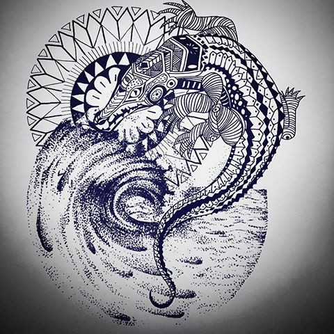 Ornamented reptile with mandala and stormy waves tattoo design
