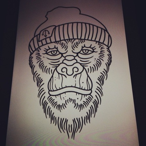 Outline gorilla hipster muzzle in hat tattoo design