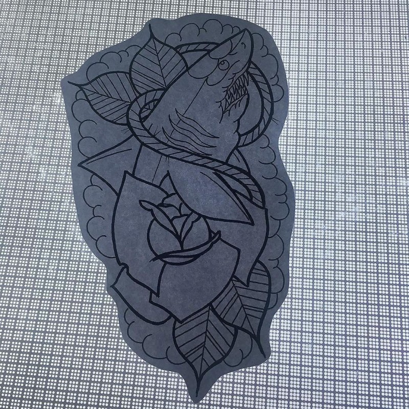 Outline roped water animal and rose bud tattoo design