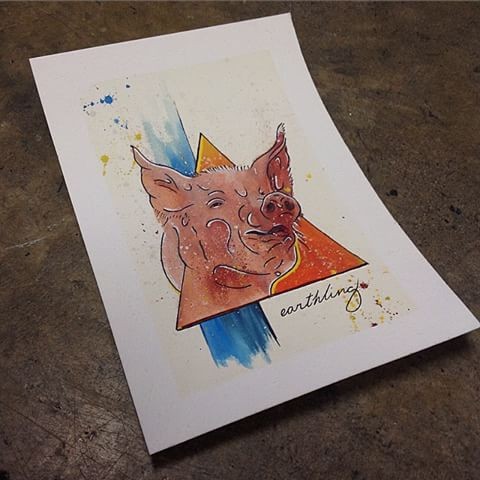 Pink pig head on orange triangle and blue line background tattoo design