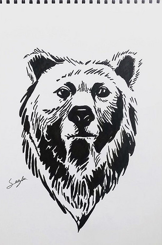 Plain black-and-white bear portrait tattoo design