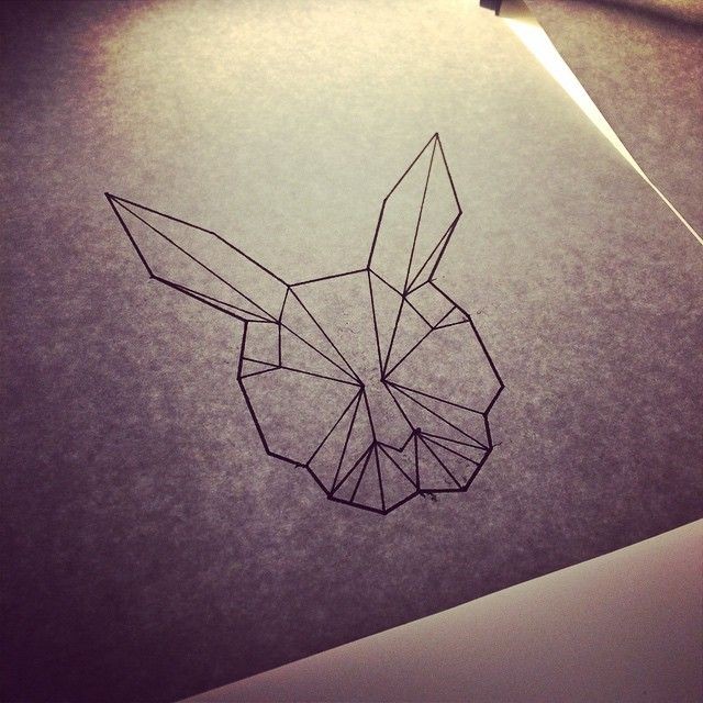 Plain geometric-style hare face tattoo design