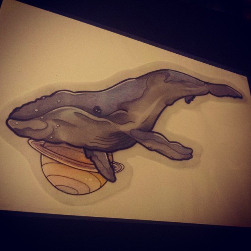 Purple swimming whale with yellow planet by side tattoo design