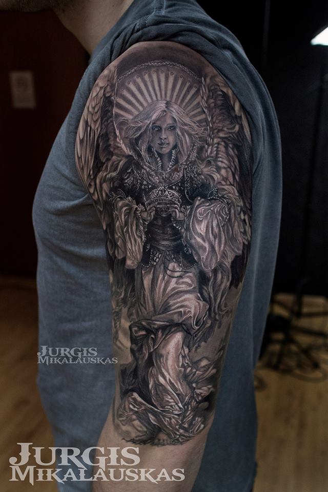 Realistic and detailed angel tattoo on sholder