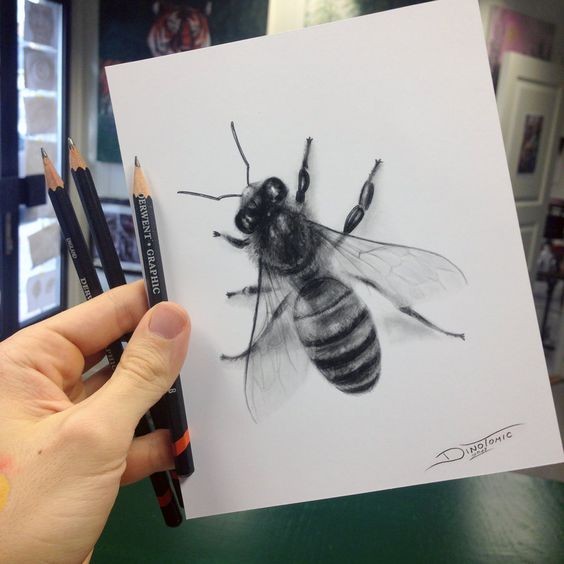 Realistic black-and-white crawling bee tattoo design