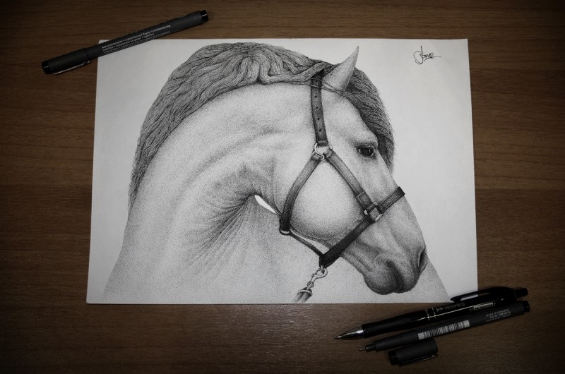 Realistic black-and-white horse head in reins tattoo design