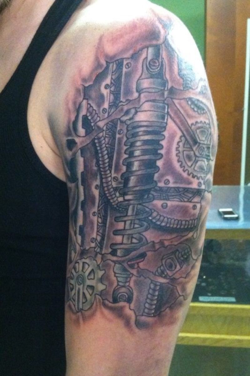 Realistic colored mechamical details tattoo on arm