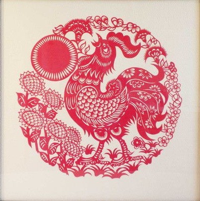 Red-ink rooster framed with flowers tattoo design