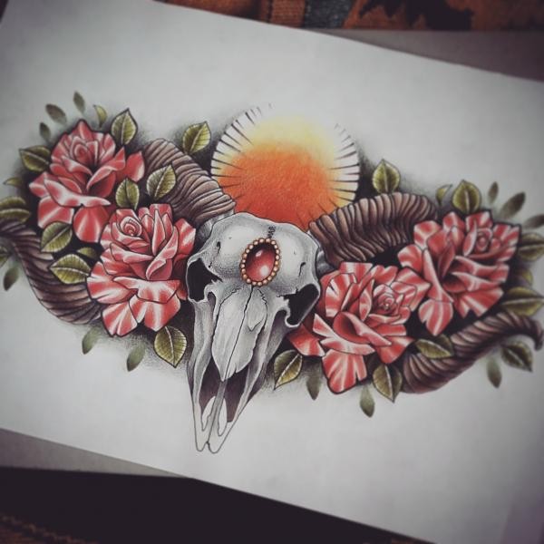 Red gem decorated ram skull with pink roses tattoo design