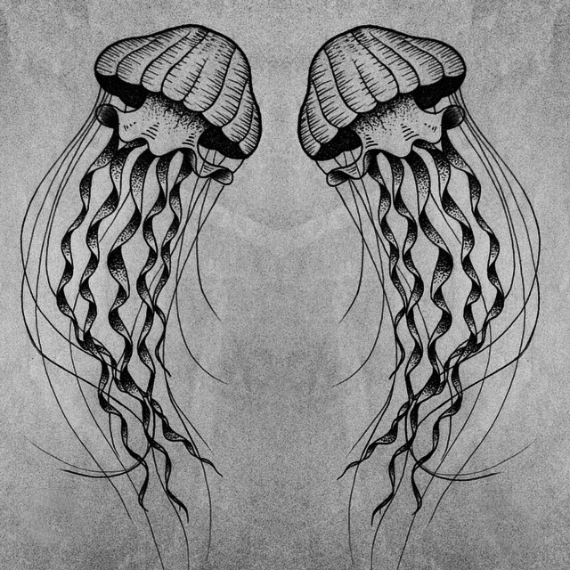Reflected black-and-white jellyfish tattoo design