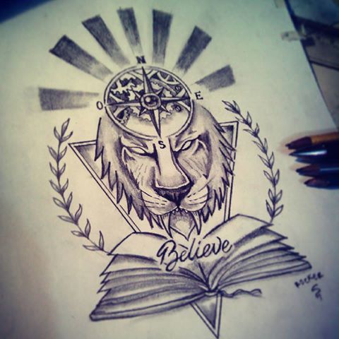 Rigeful lion head with book and shining compass tattoo design