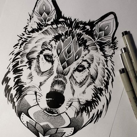 Sad black-and-white wolf with floral pattern tattoo design
