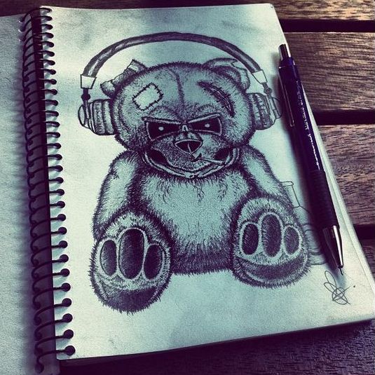 Scary black-and-white teddy bear in earphones tattoo design