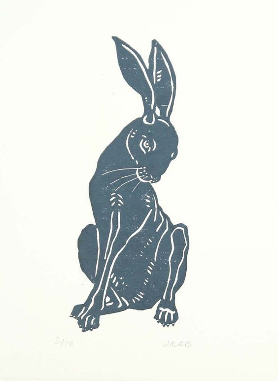Shy blue-ink sitting hare tattoo design