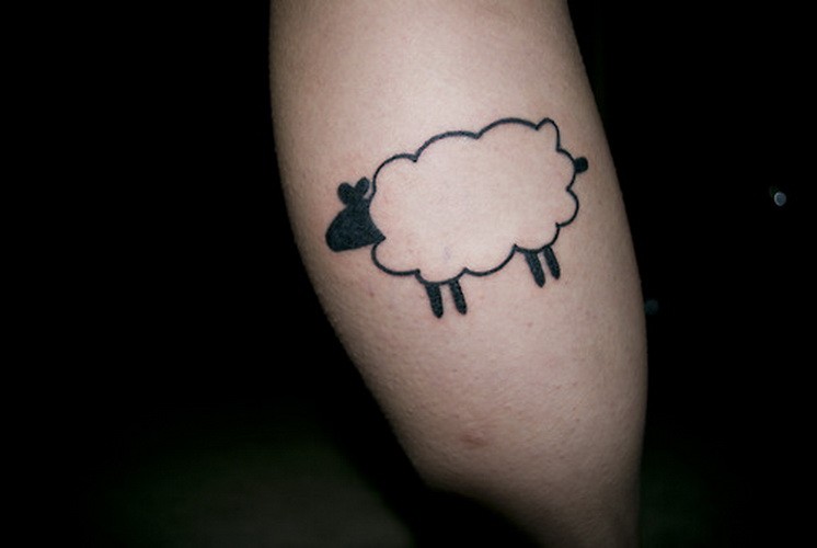 Simple black-ink sheep tattoo on shin