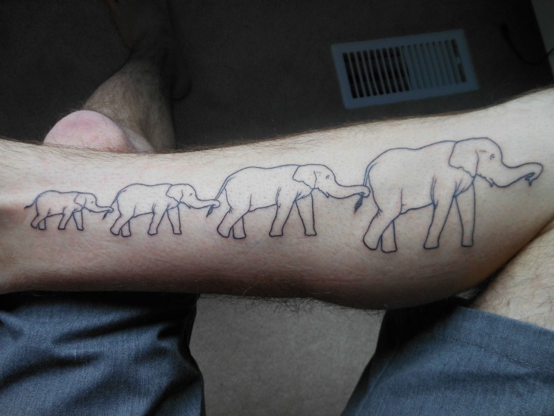 Simple elephant family hanging by tales tattoo on shin