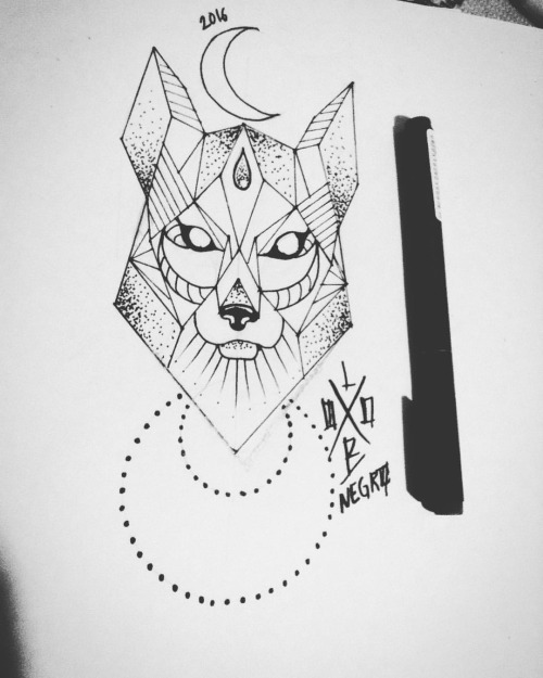 Simple geometric wolf face and moons tattoo design