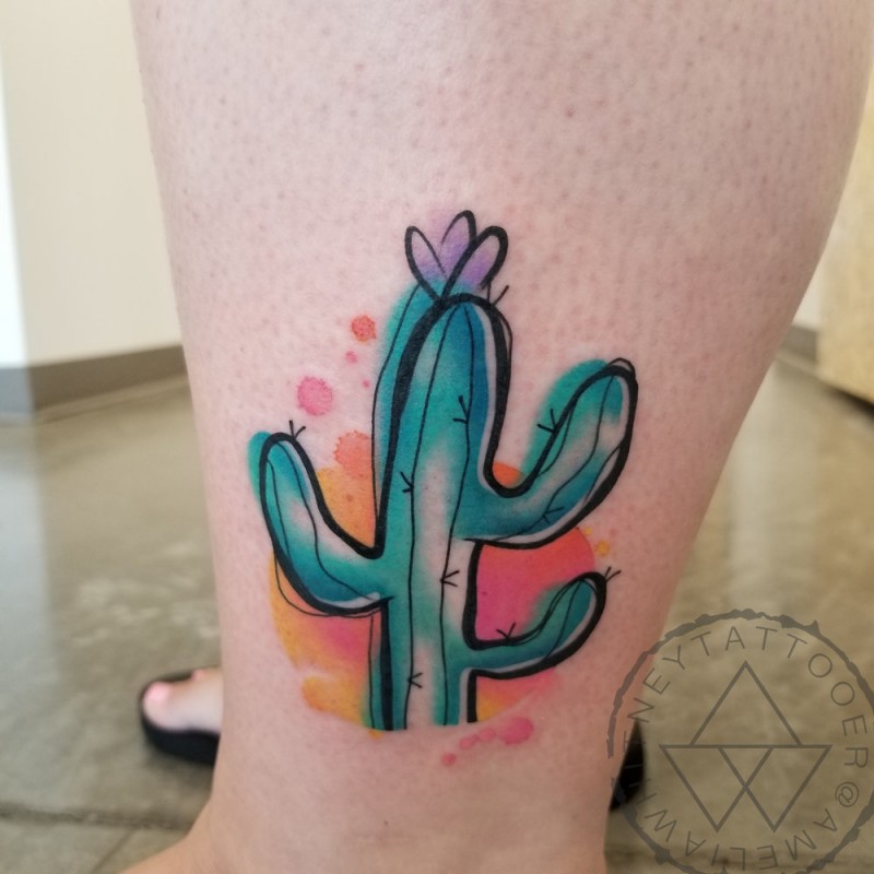 Simple watercolor cactus tattoo on leg
