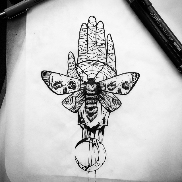 Skull-patterned moth with moon on bandage hand background tattoo design