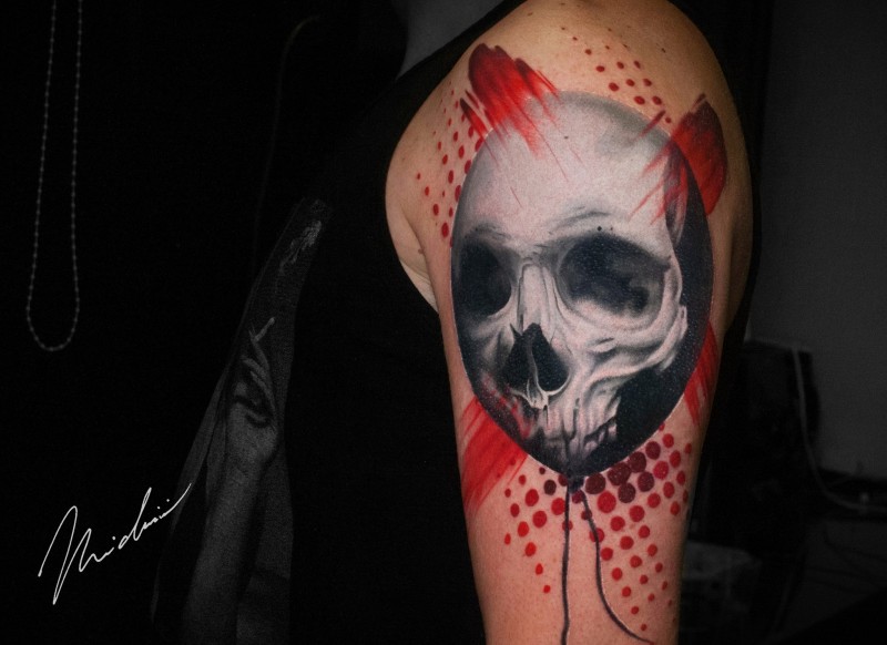 Skull balloon tattoo on shoulder
