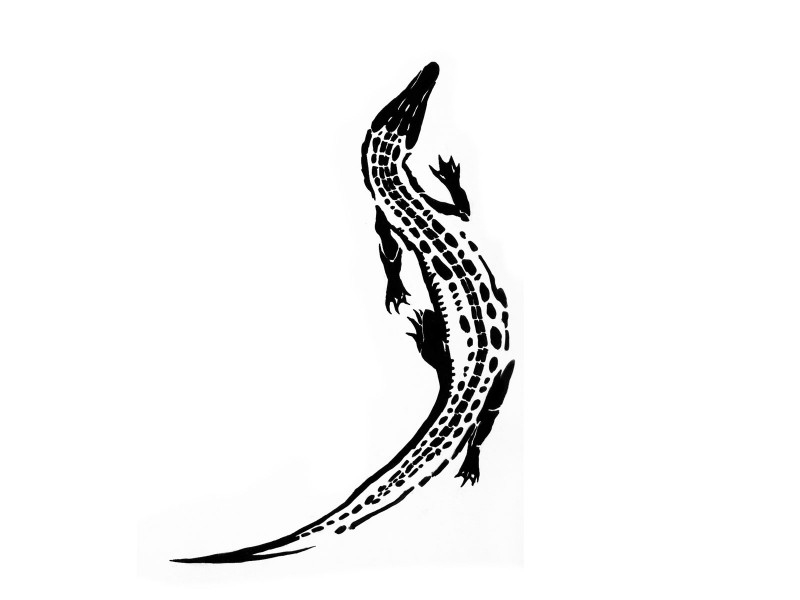 Slim black-ink reptile silhouette print tattoo design