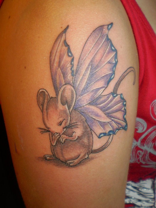 Small cute girly rodent with butterfly wings tattoo on upper arm