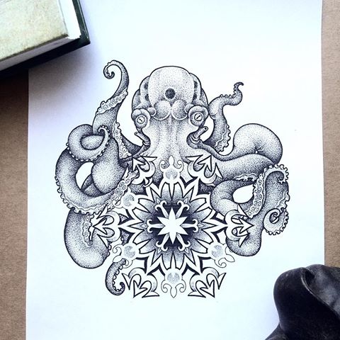 Small dotwork octopus embracing mandala flower tattoo design