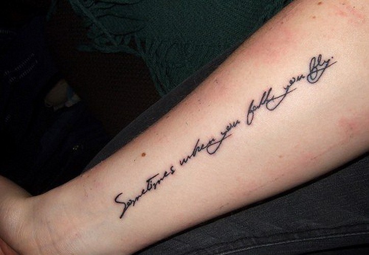 Sometimes when you fall you fly quote tattoo on arm