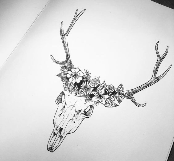 Splendid deer skull in wreath tattoo design