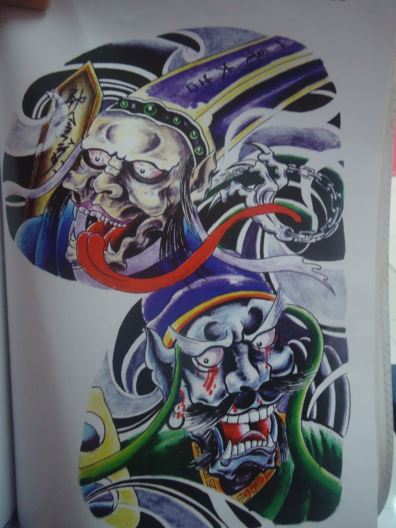Splendid multicolor demon faces in japanese style tattoo design