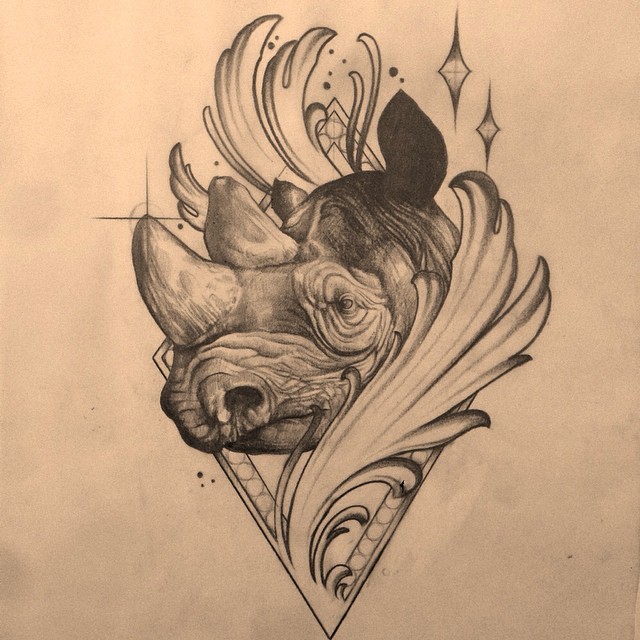 Static grey-ink rhino head with decorations tattoo design