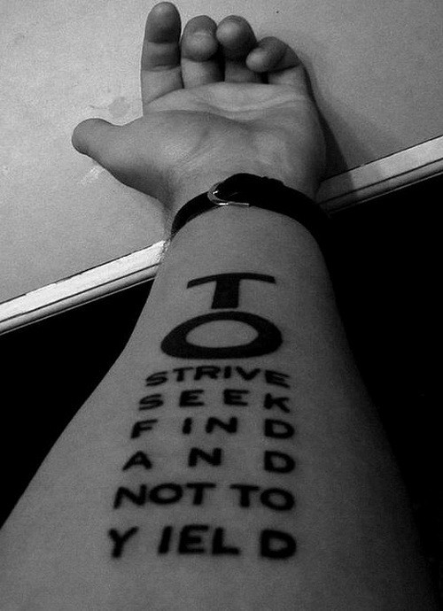 Strive seek find and not to yield quote with male sign tattoo on arm