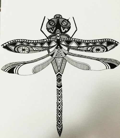 Superior black ornate dragonfly tattoo design