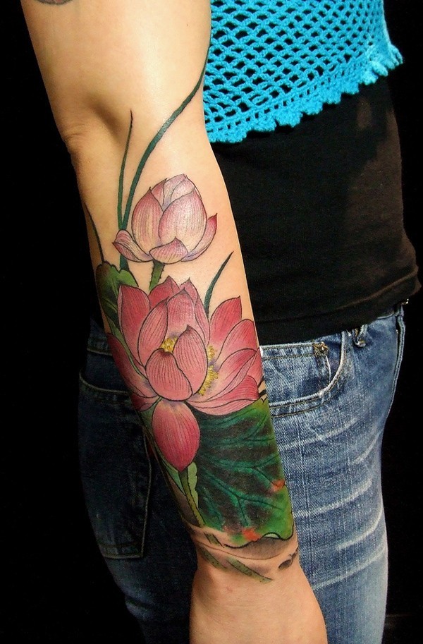 Tender pink lotus flower tattoo sleeve for women on forearm