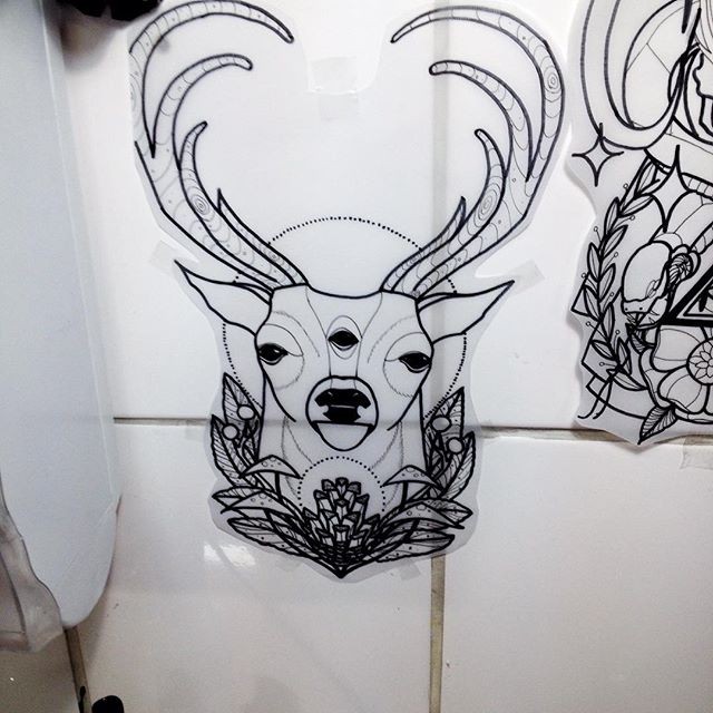 Three black-eyed deer tattoo design
