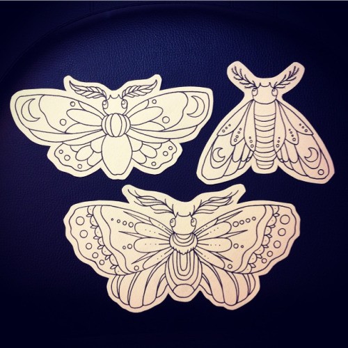 Three sweet small uncolored moths tattoo designs