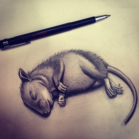 Tiny grey dleeping rodent tattoo design