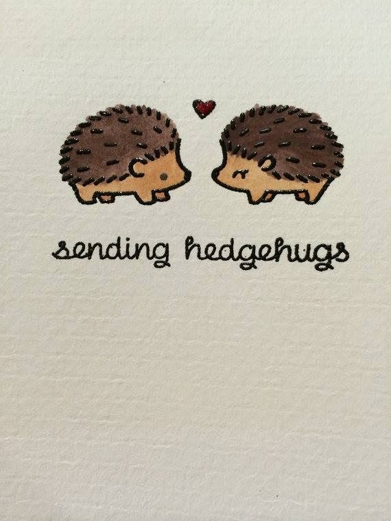 Tiny kissing hedgehog couple with lettering tattoo design