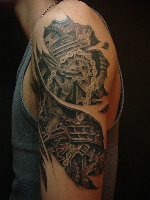 Traditional black-and-white wired robot tattoo with cogwheels on arm