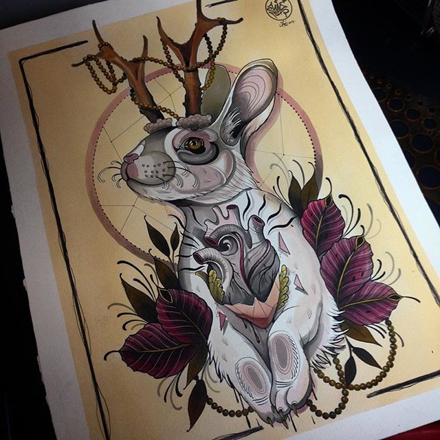 Traditional multicolor rabbit with deer horns and heart tattoo design