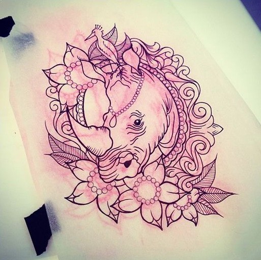 Traditional rhino head in frame with flowers and bird tattoo design