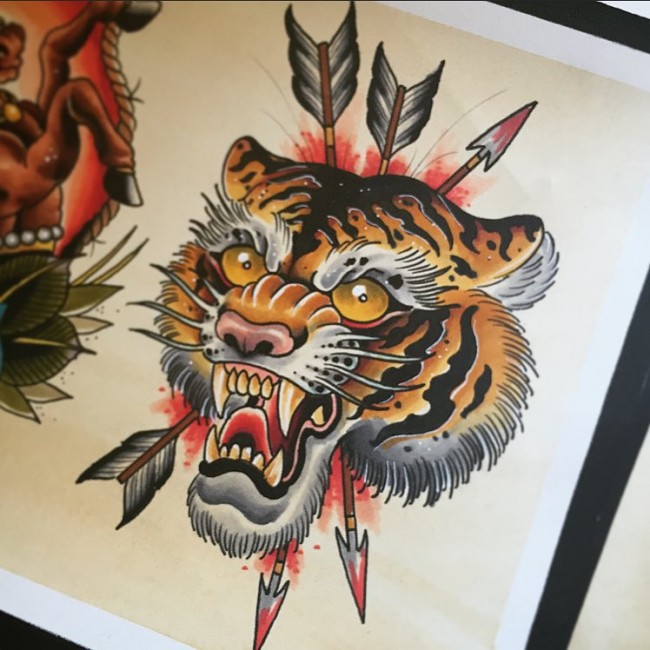 Traditional tiger head pierced with a lot of arrows tattoo design
