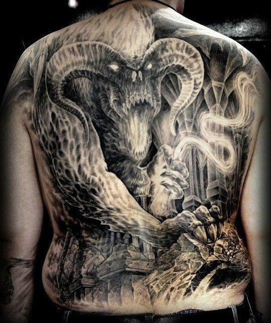 Unbeliveable whole back tattoo of Lord of the Rings monster