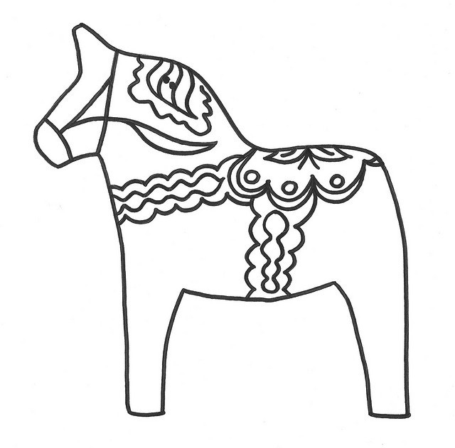 Uncolored horse toy with flowered saddle tattoo design