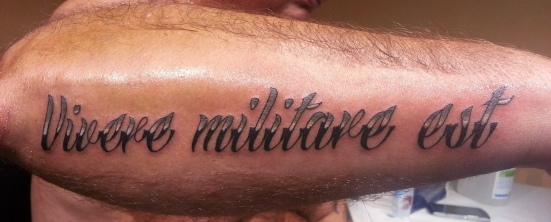 Vivere militare est latin quote tattoo on arm