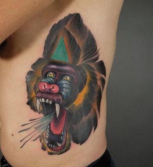 Vivid-colors baboon portrait tattoo on ribs