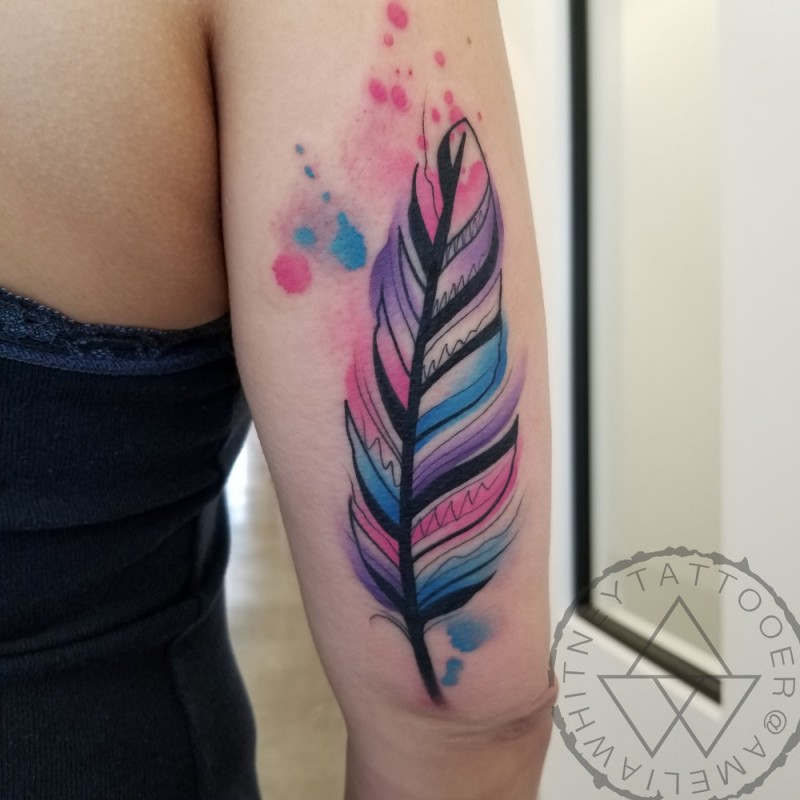 Watercolor feather tattoo on arm1