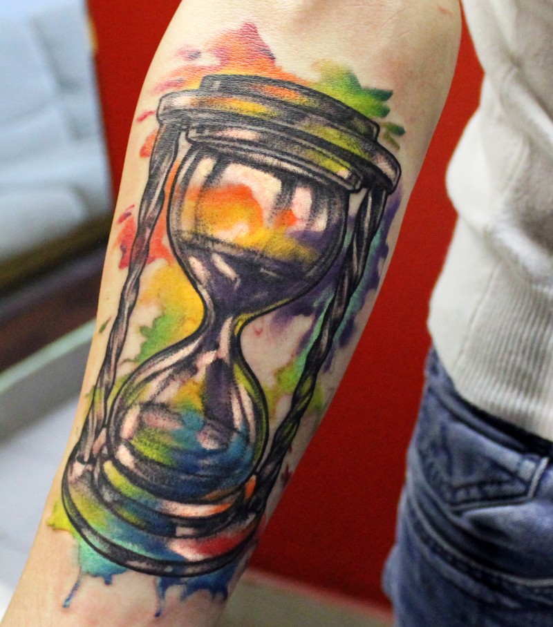 Watercolor hourglass forearm tattoo
