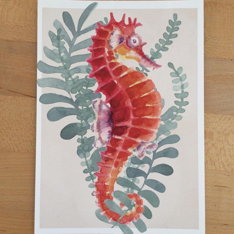 Watercolor red seahorse and leaved branches tattoo design